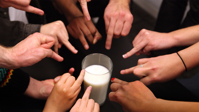 Illustration for article titled Astounding: 7 Incredible Photos Of Hands Pointing To Glasses Of Milk With Their Ring Fingers